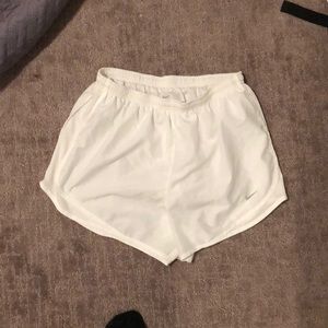 white nike running shorts